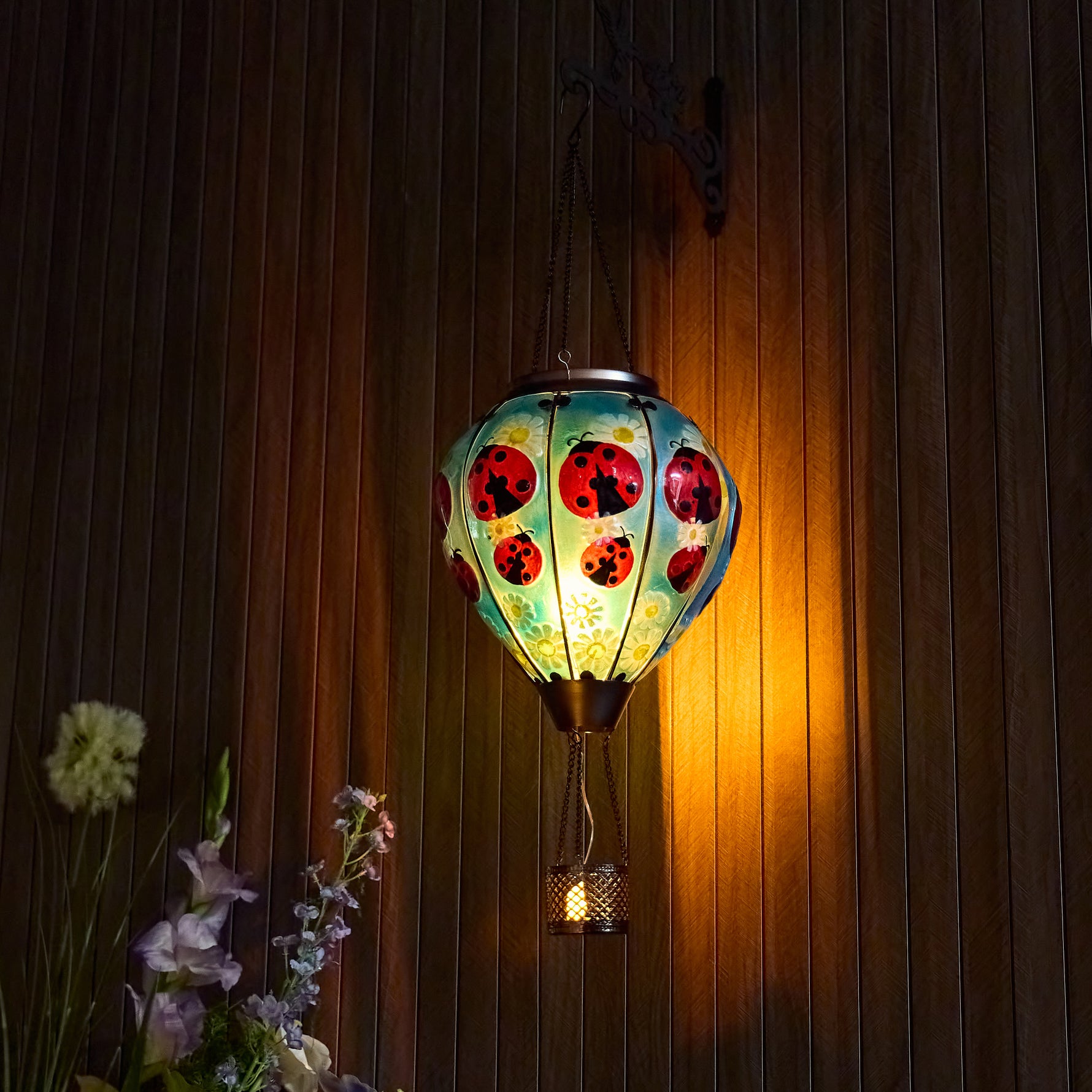 Outdoor beetle-pattern glass solar balloon lantern for yard decoration, backyard lights, and patio solar décor with flame-effect LED lighting