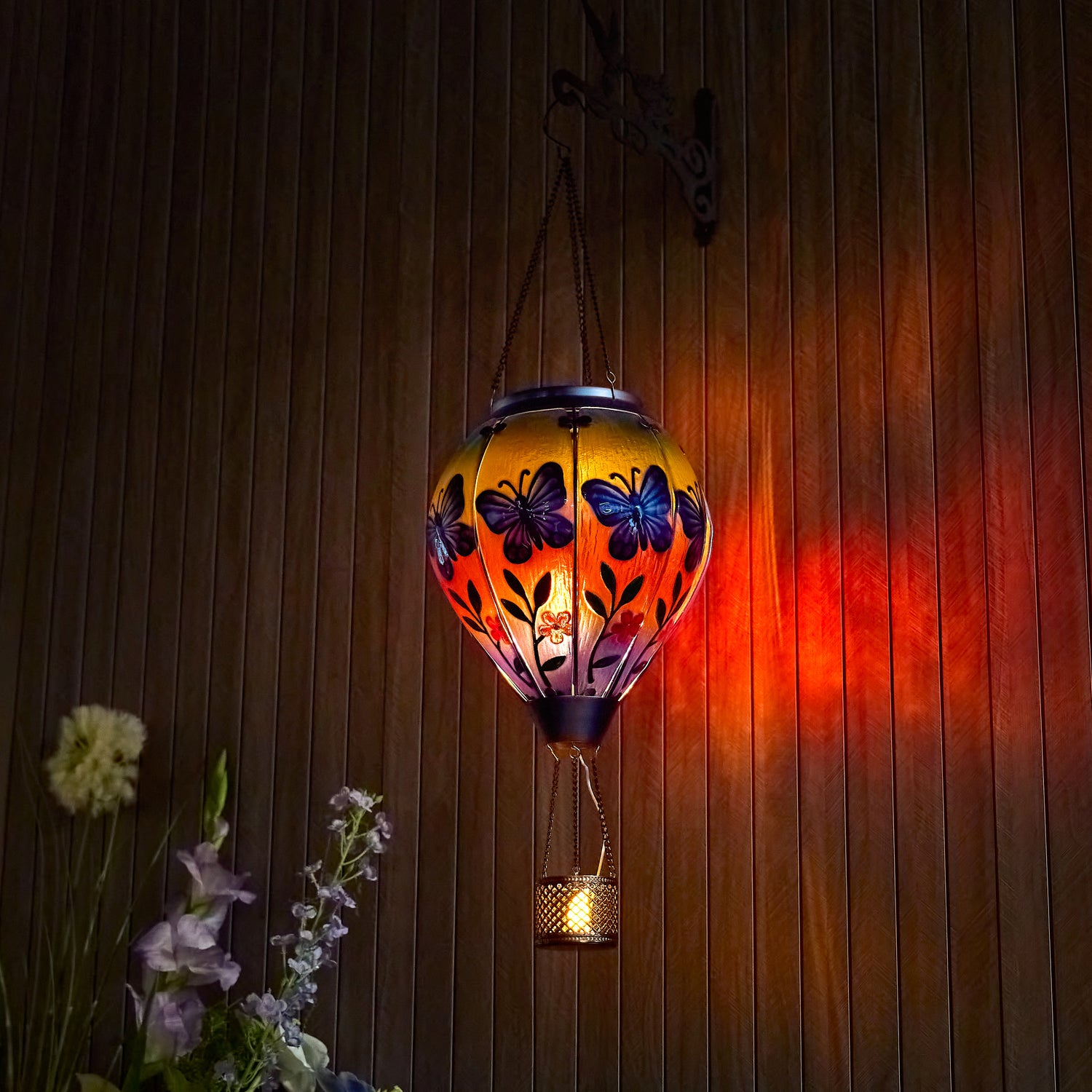Butterfly design lantern with flame-style solar light, ideal for patio solar LED lights and seasonal yard decorations