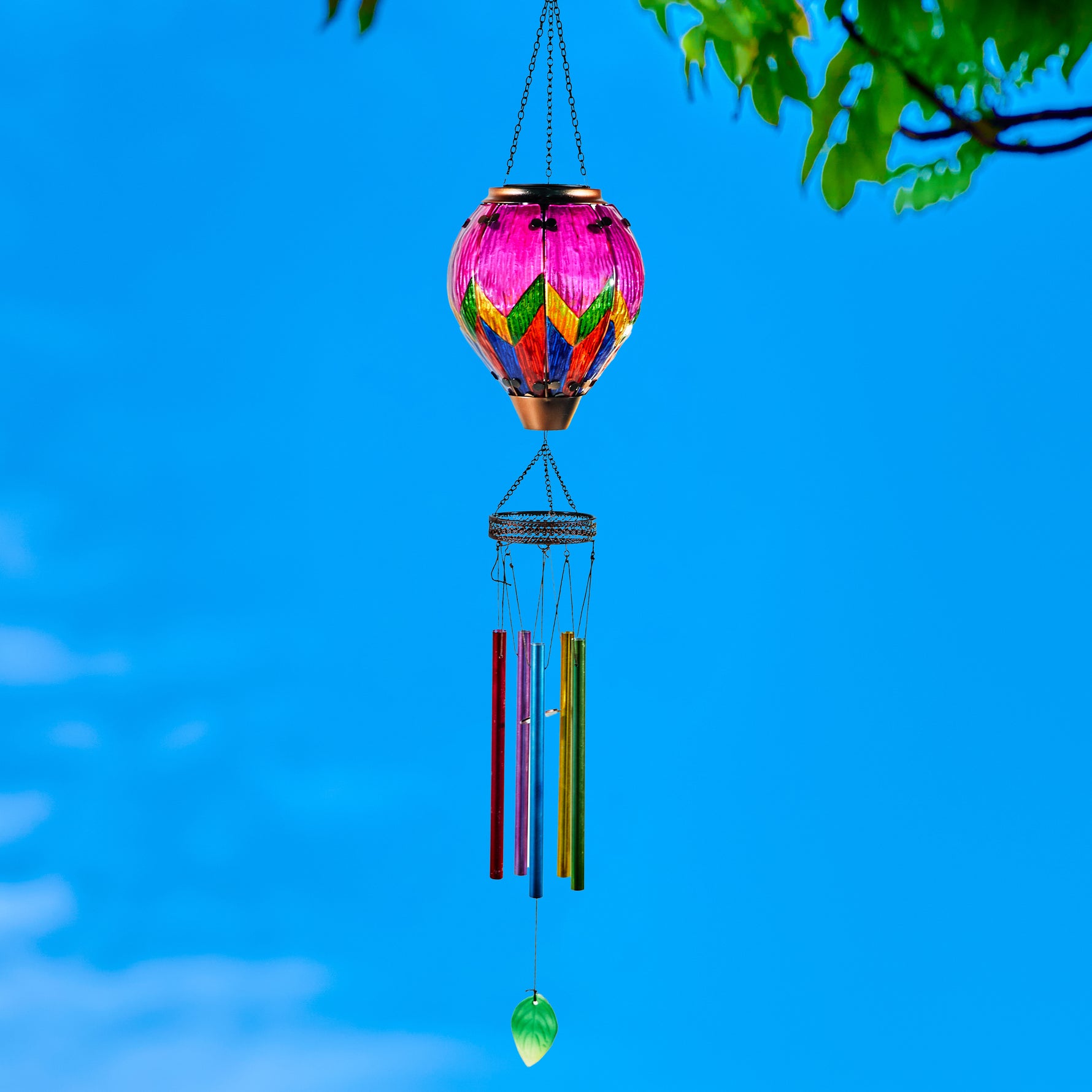 Colorful glass solar hot air balloon lantern with a hanging wind chime for backyard decorations, patio décor, and garden solar lights featuring a warm flame-effect glow