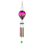 Outdoor colorful solar hot air balloon lantern paired with a decorative wind chime for backyard decorations, garden solar lights, and patio night ambience