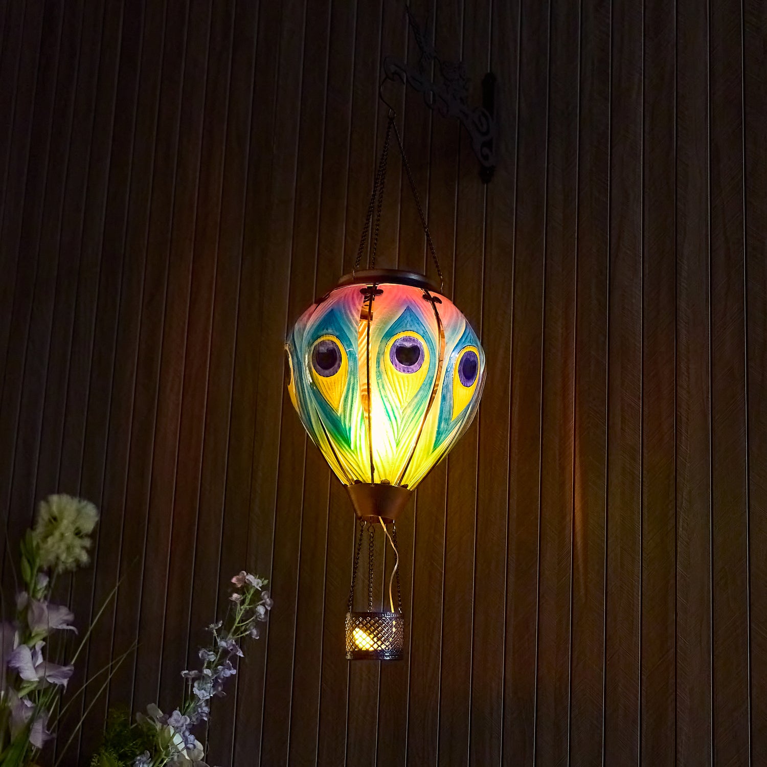 Decorative peacock feather solar balloon lantern for backyard decorations, garden solar lights, and patio decor ideas with a soft flame-style LED glow