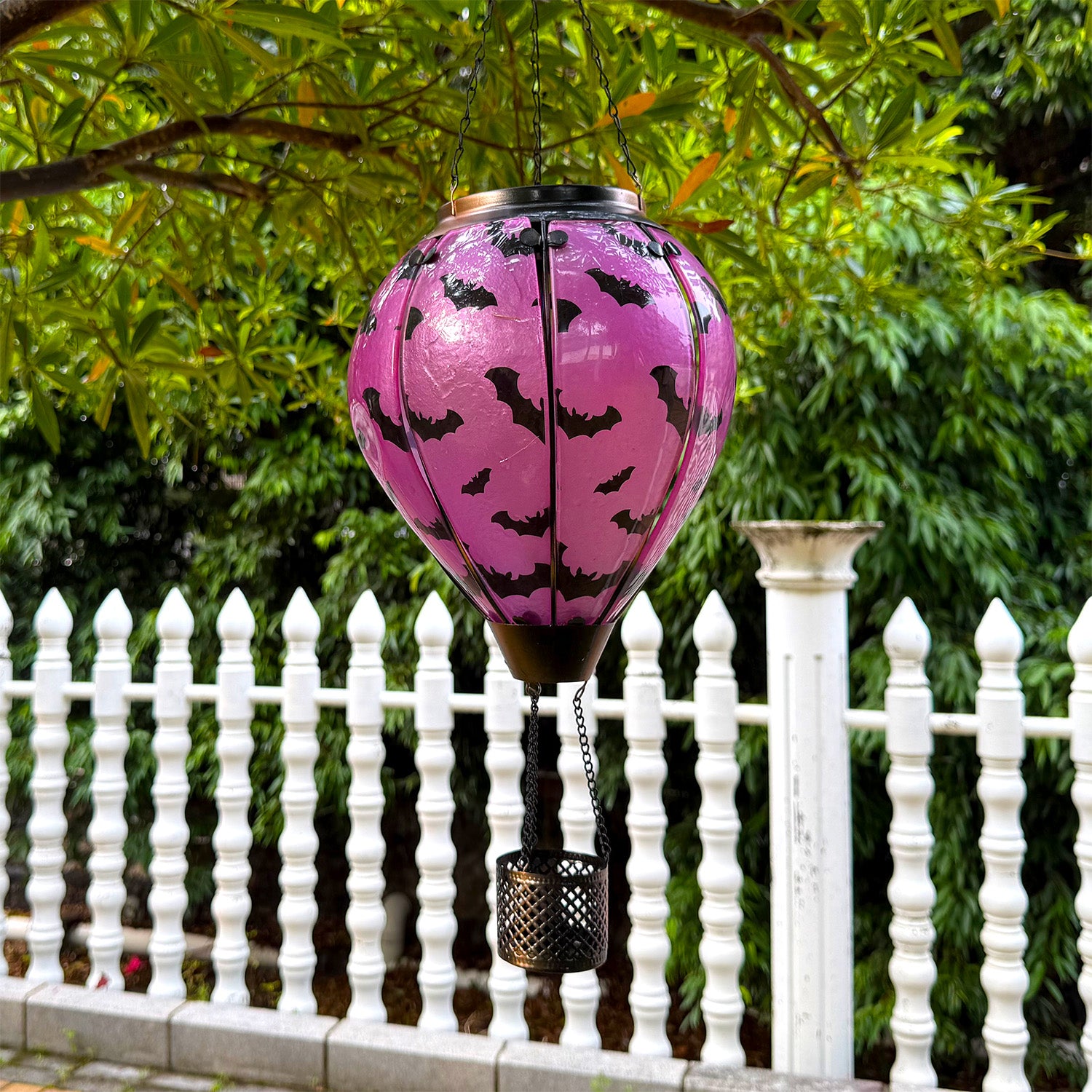 hand-painted bat hot air balloon solar lantern in daylight for outdoor yard decorations