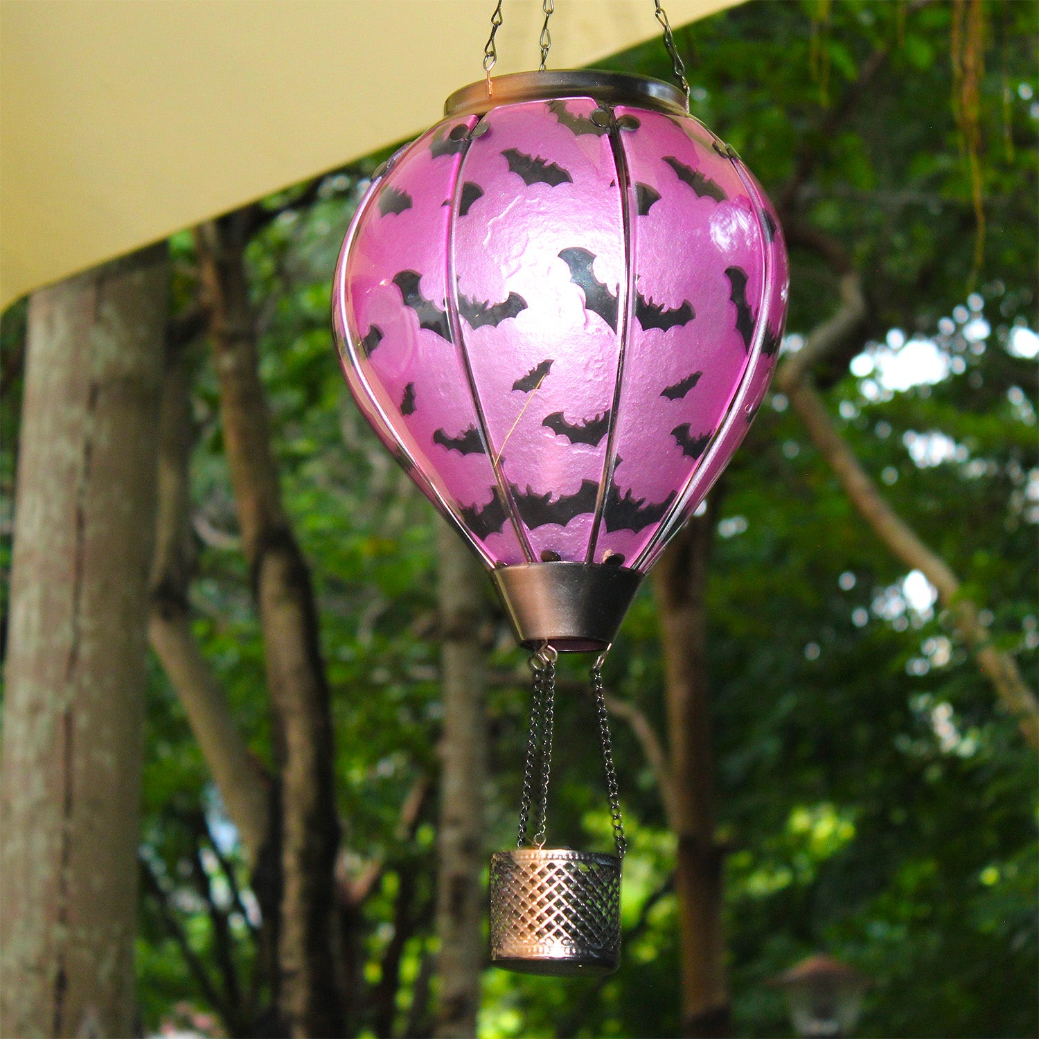 bat-themed solar balloon lantern hanging on patio, perfect for yard decor