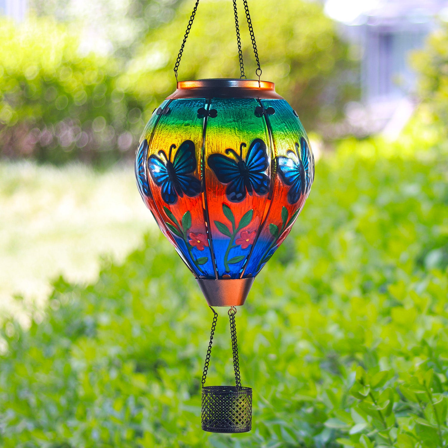 Decorative balloon lantern with butterfly artwork glowing at dusk, enriching backyard lights and patio solar decorations