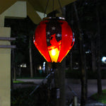 glowing patriotic hot air balloon lantern with cardinal bird design for backyard and patio night decor 