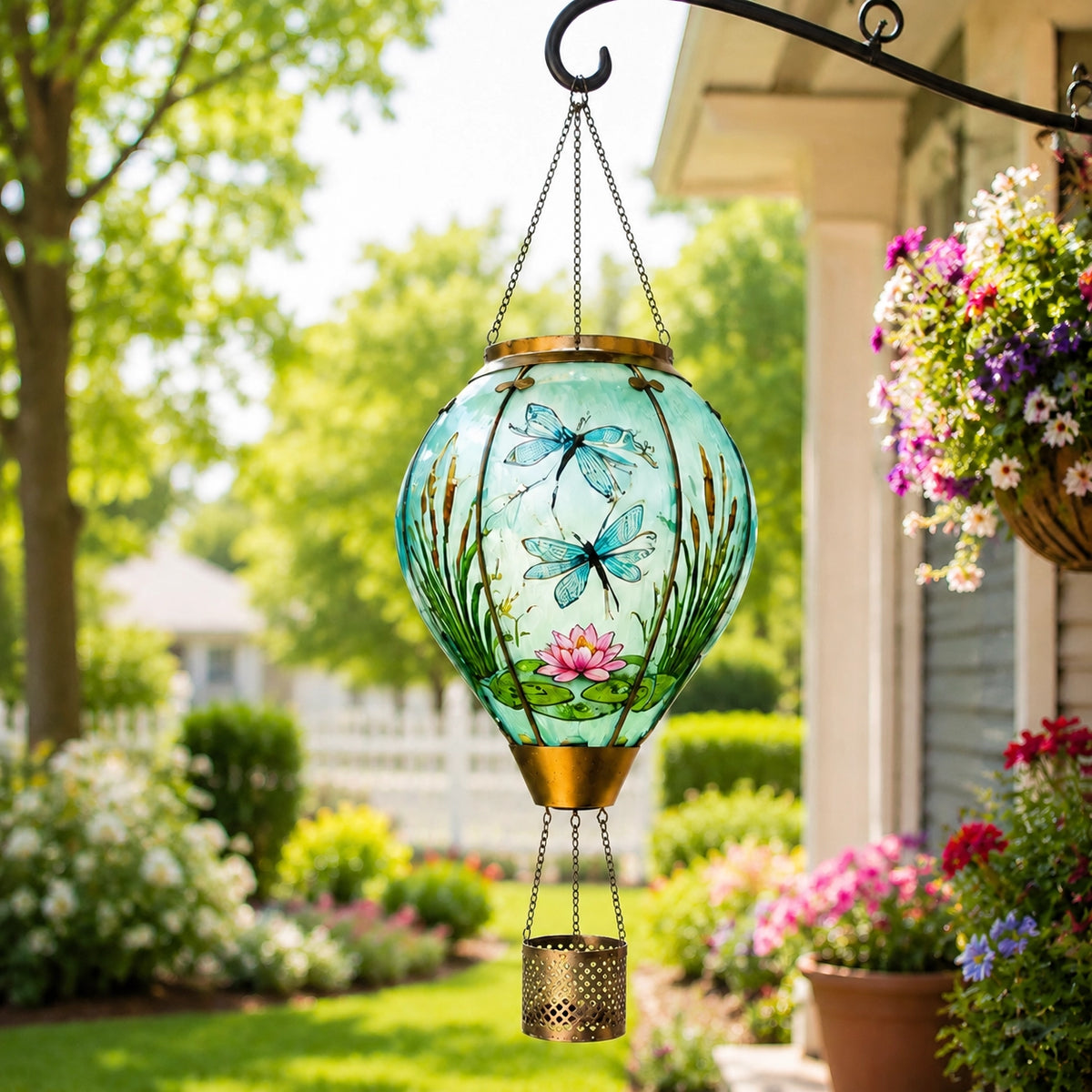 Dragonfly and lotus hot air balloon solar lantern hanging beside a flower garden porch