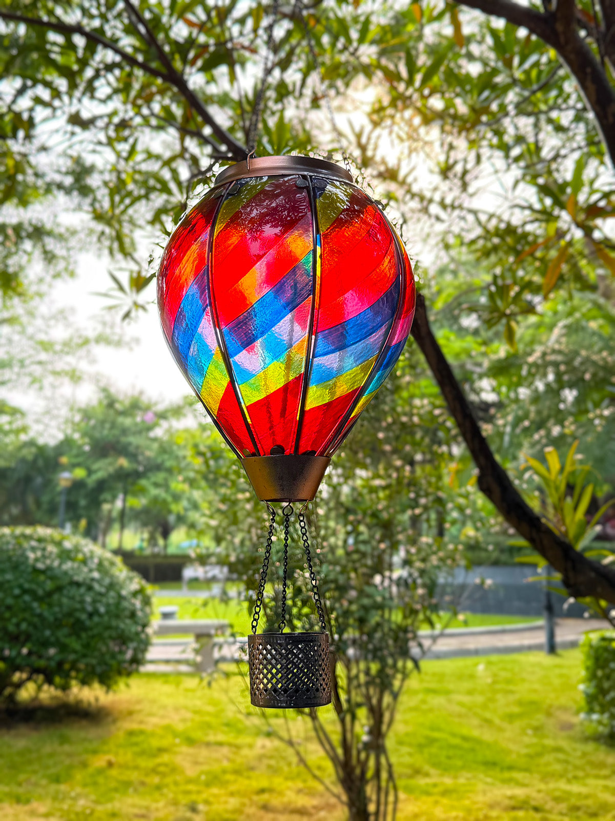 hot air balloon solar lantern used for backyard decorations and garden solar lights creating cozy outdoor ambiance