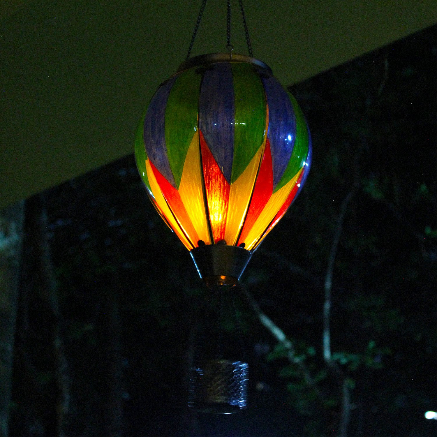 colorful hot air balloon solar lantern used as ambient patio decor, ideal for evening gatherings