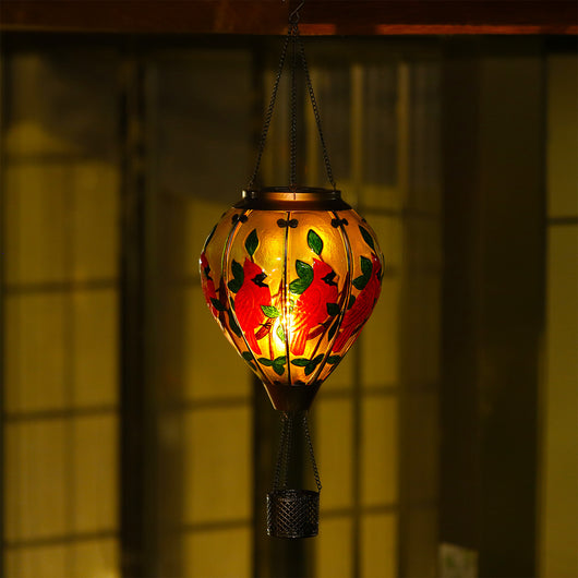 Patriotic-themed cardinal bird solar lantern with balloon shape for outdoor garden lantern display and solar yard lights