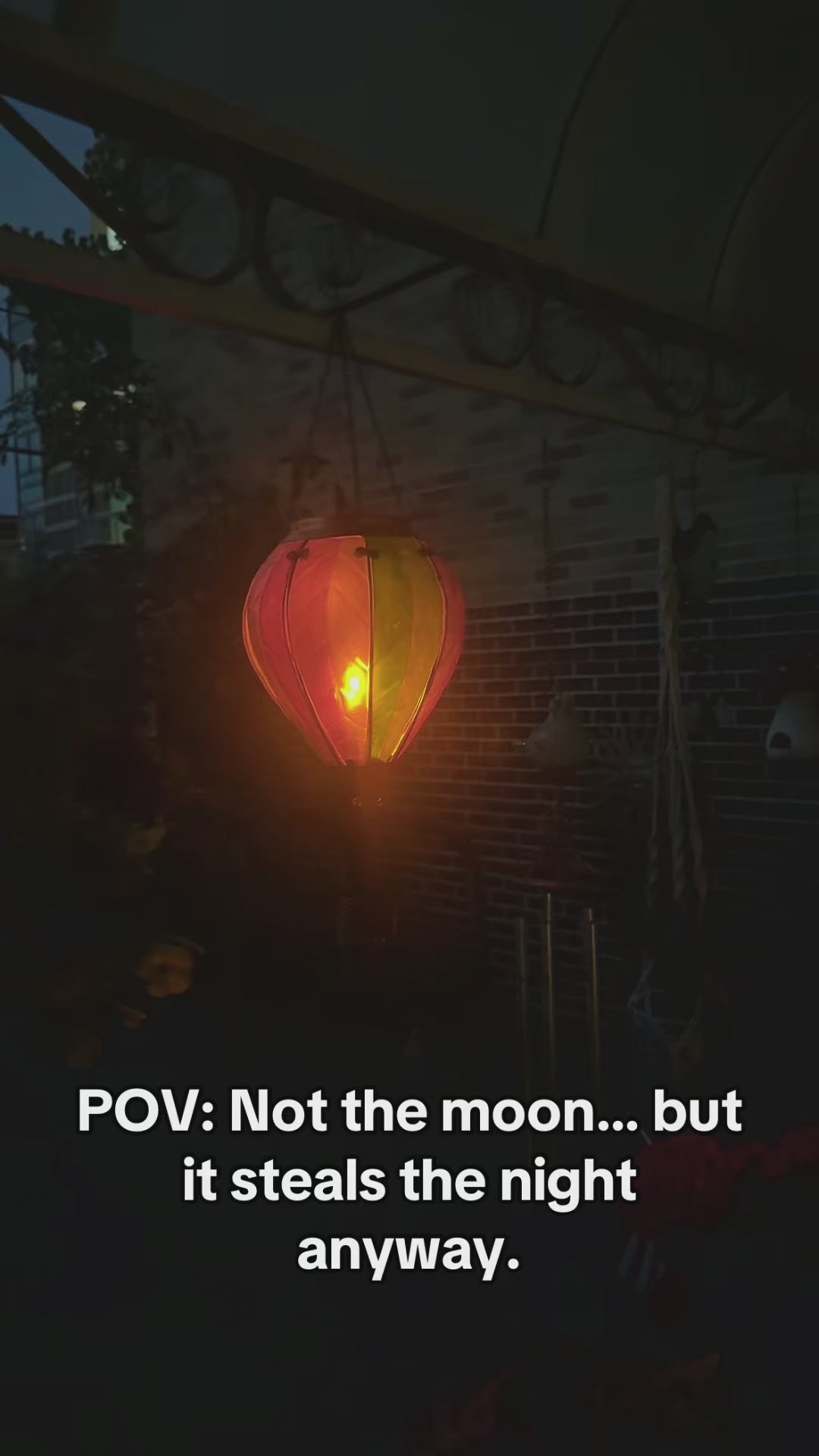 Solar-powered balloon lantern with gradient rainbow colors, perfect for backyard solar lighting and garden decor