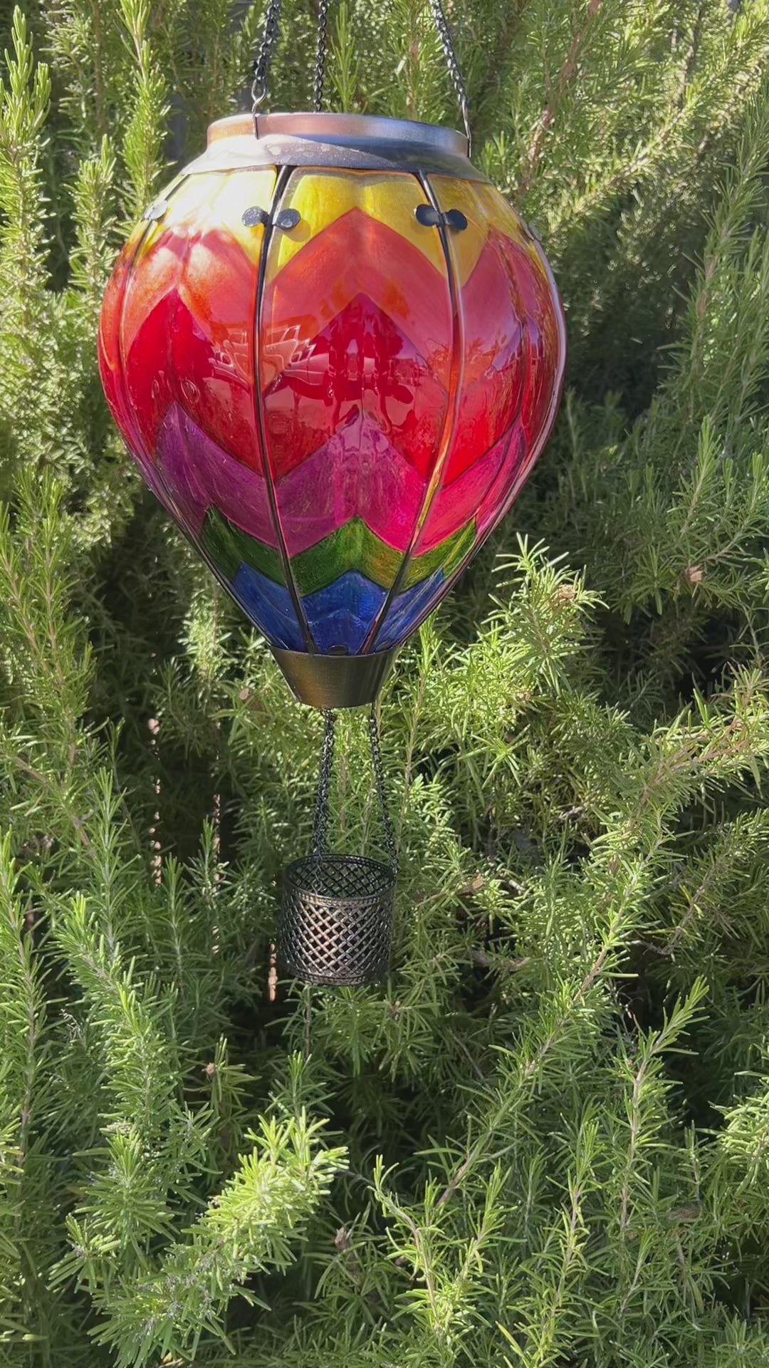 Rainbow-themed balloon lantern adding whimsy to backyard decorations and garden solar lantern displays