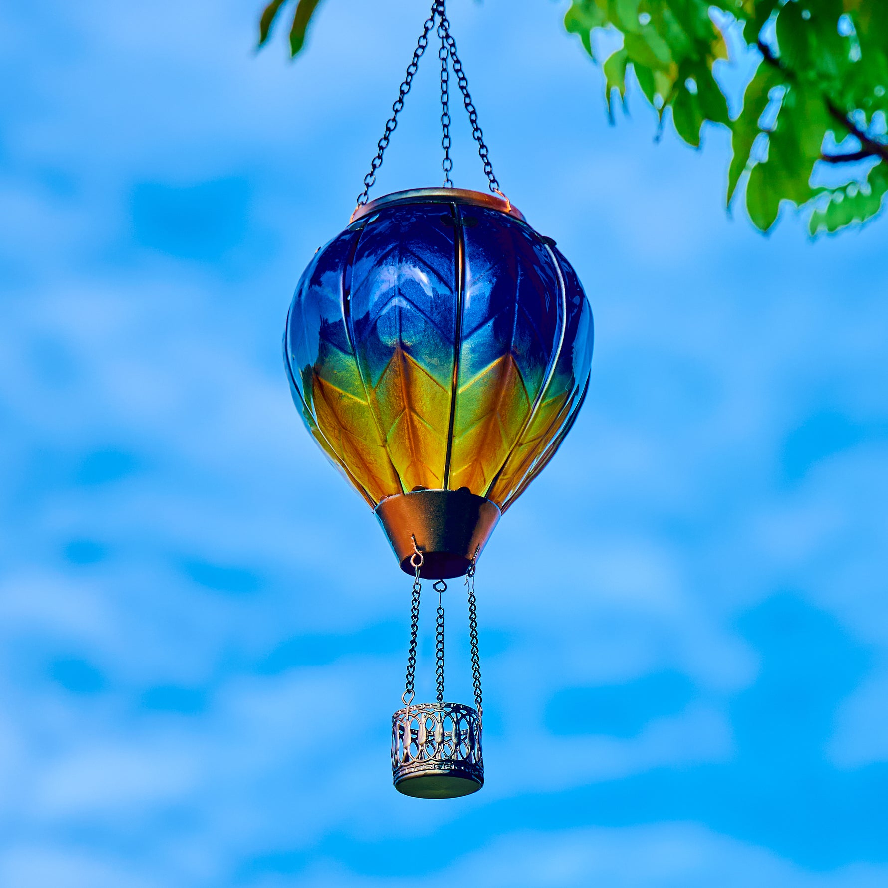 Hot air balloon solar lantern with purple to yellow gradient glow, perfect for backyard decorations and solar garden lights