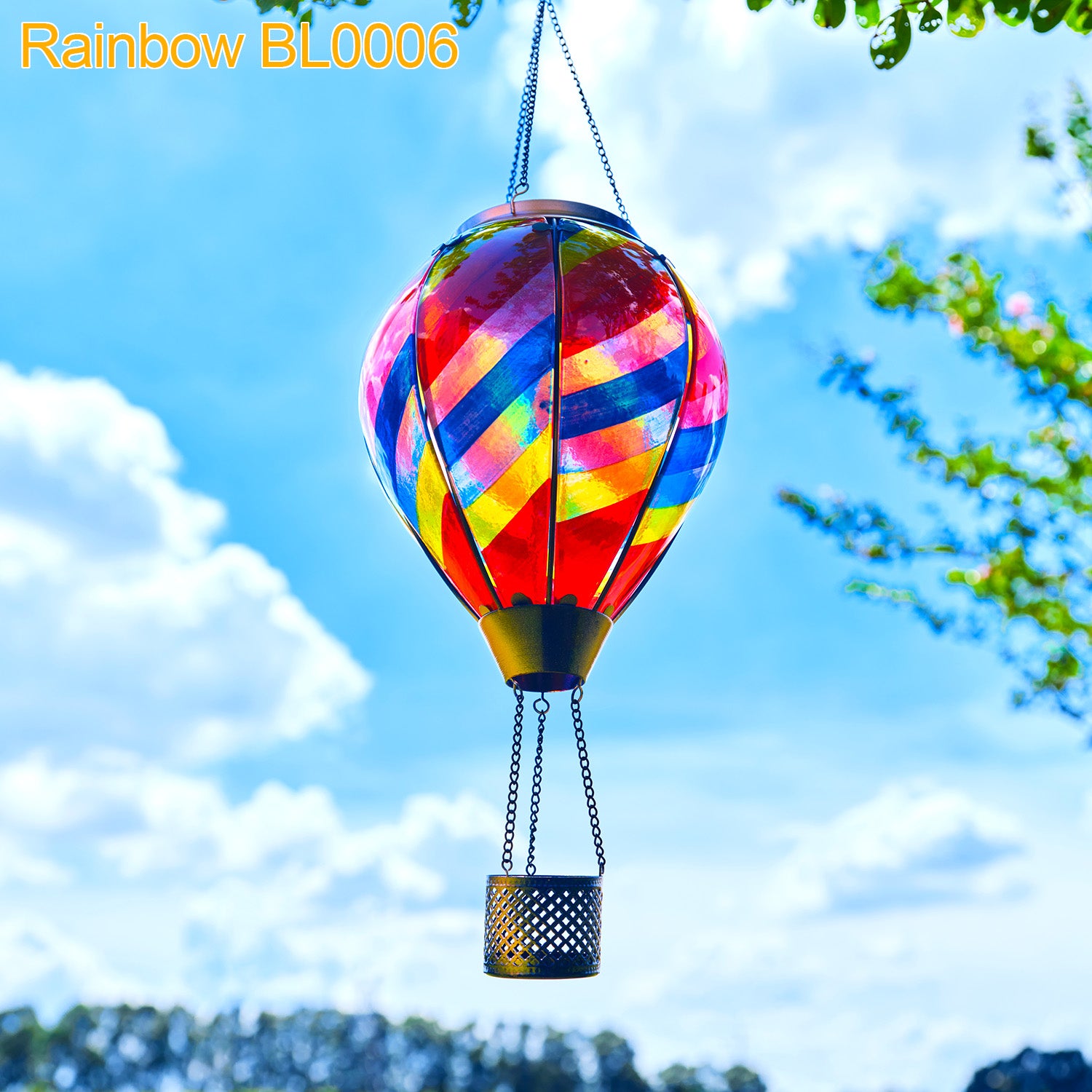 Rainbow hot air balloon lantern glowing in backyard foliage, perfect for solar garden lights and backyard solar lighting