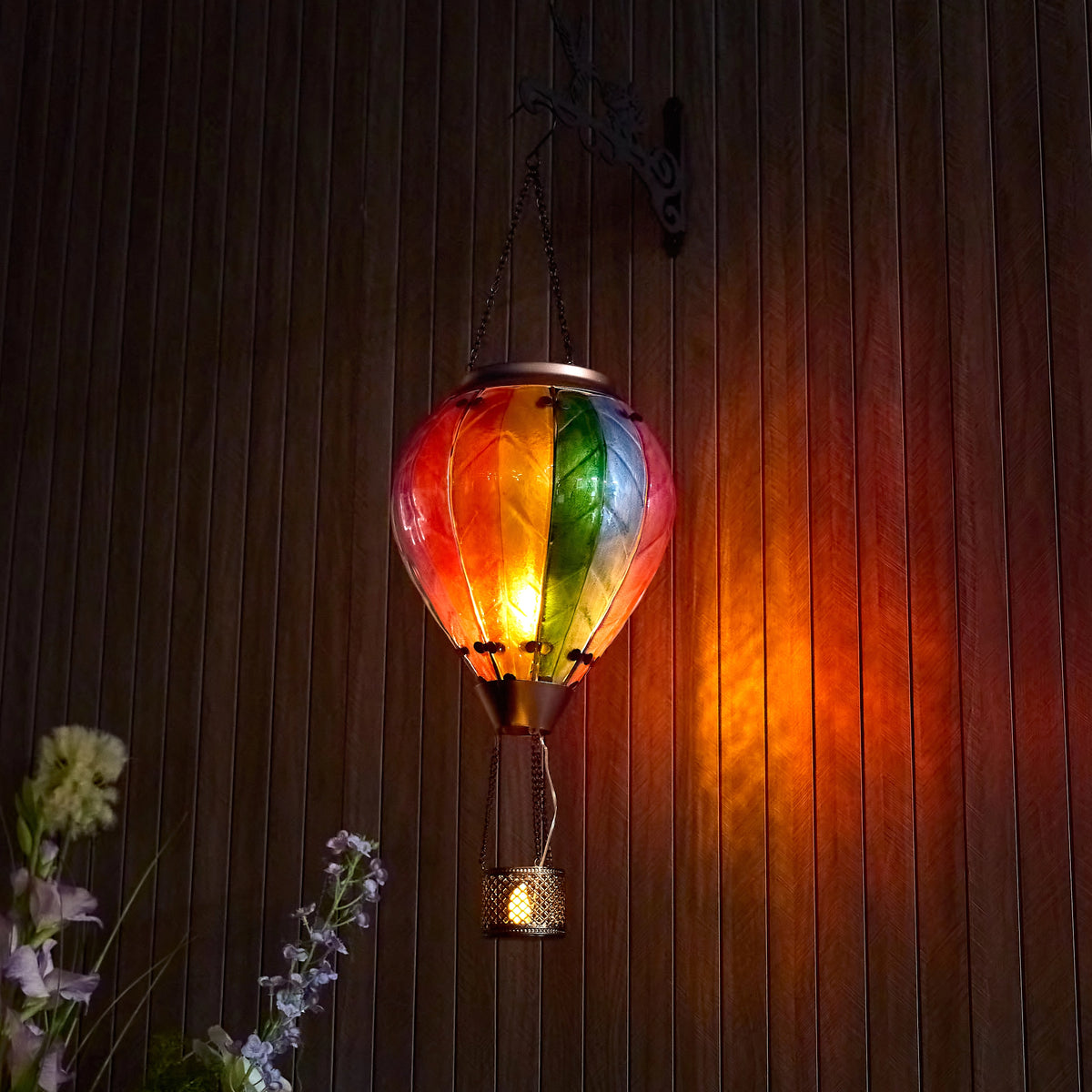 Close-up of the hand-painted glass texture and rainbow colors on the solar lantern