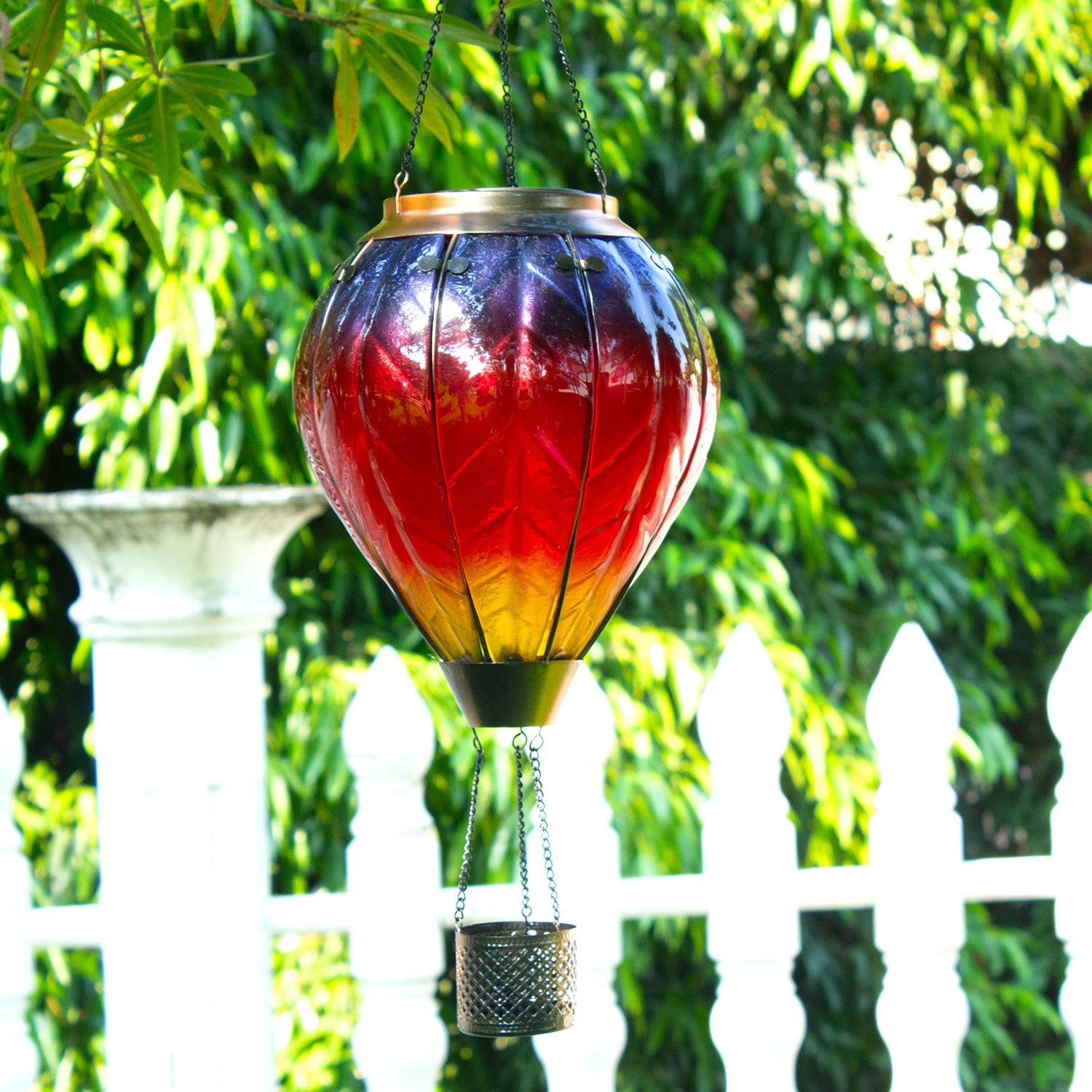 vibrant rainbow solar balloon lantern adding charm to yard decorations